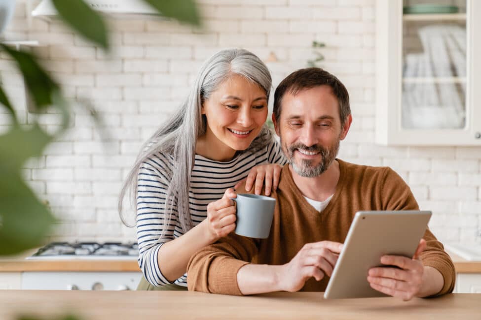 Mature couple applying for a debt consolidation loan