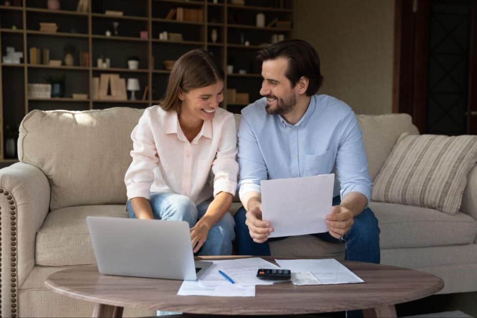 Couple reviews tax documents to amend their tax return