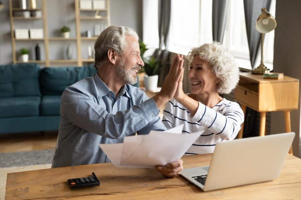 Mature couple is excited to lower their taxable income